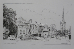 Cross and church Repton with cars