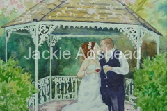 Cherry blossom gazebo kiss